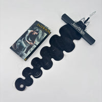 Full view of a JAZZWIGS Raw Vietnamese body wave hair bundle with a display clip and product card.