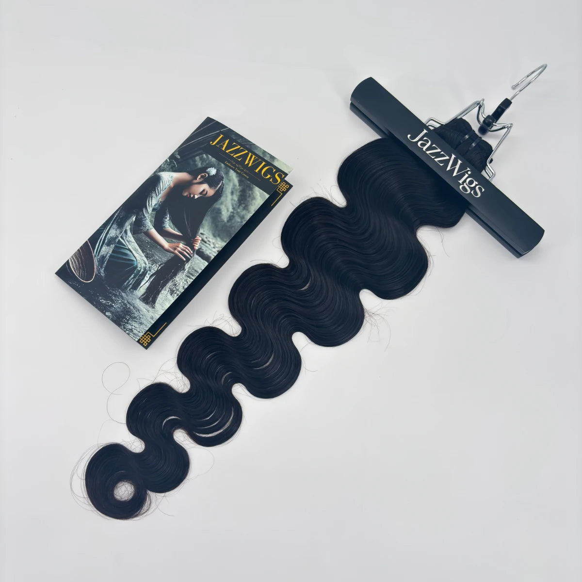 Full view of a JAZZWIGS Raw Vietnamese body wave hair bundle with a display clip and product card.