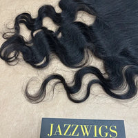 Natural body wave Black hair using 13x6 HD lace frontal for flawless styling.
