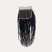 Natural black 5x5 HD lace closure curly human hair for wig making and salon use.