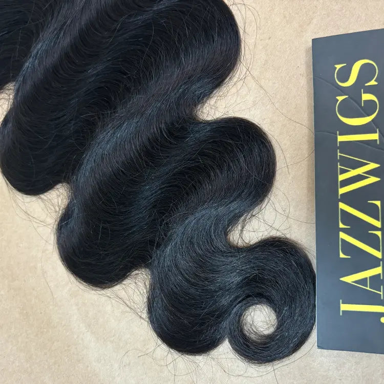 Black hair body wave closure featuring 6x6 HD lace for wig vendors.