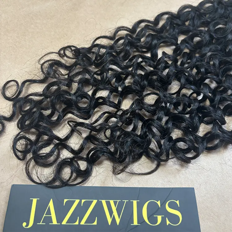 Natural-looking Burmese curly Black hair using a 6x6 HD lace closure.