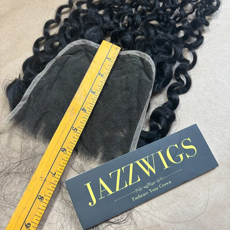 Virgin Burmese curly 3 bundles with 6x6 HD lace closure for Black women.