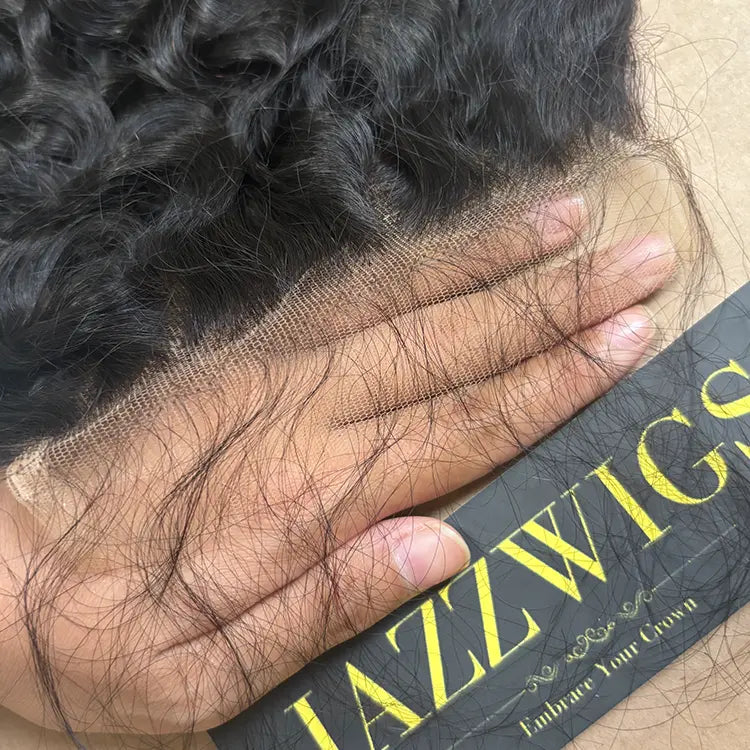 Burmese curly 6x6 HD lace closure showing an invisible melt hairline.