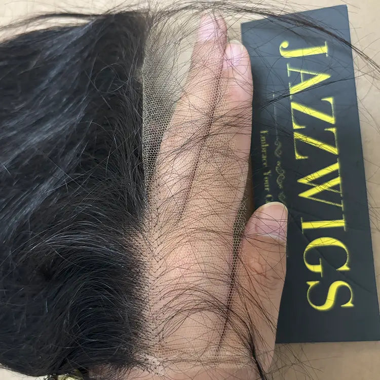 Natural-looking straight Black hair using a 6x6 HD lace closure.