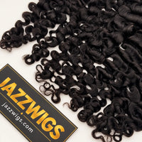 Close-up of the curly ends of #1B Burmese Curly Feather Crochet human hair