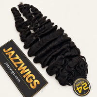 Overhead view of one pack of #1B Burmese Curly Feather Crochet human hair