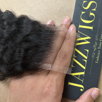Natural-looking Burmese curly Black hair with 2x6 HD lace closure.
