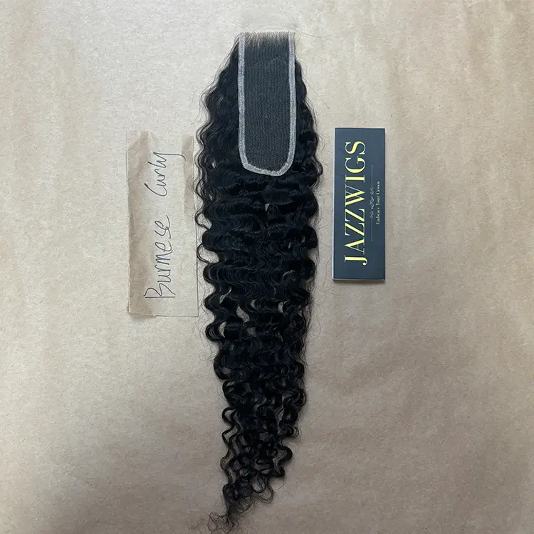 2x6 HD lace closure paired with raw Burmese curly Black hair bundles.