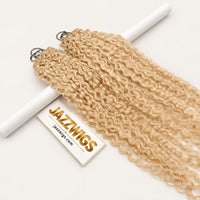 JAZZWIGS #613 Blonde Burmese Curly Feather Crochet Human Hair, angled product view over a white support
