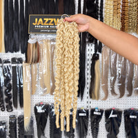 JAZZWIGS #613 Blonde Burmese Water Curly Feather Crochet Human Hair, handheld full-length showroom view