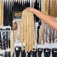 JAZZWIGS #613 Blonde Burmese Water Curly Feather Crochet Human Hair, additional handheld showroom view