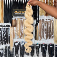 JAZZWIGS #613 blonde raw Body Wave hair displayed in the showroom