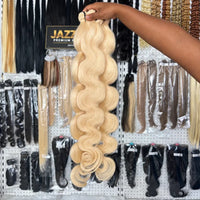 Full-length showroom view of #613 blonde raw Body Wave hair
