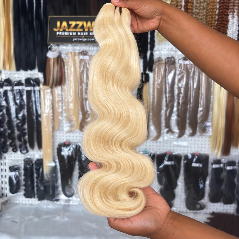 Close showroom view of #613 blonde raw Body Wave hair texture