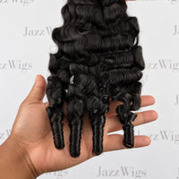 JAZZWIGS #1B Natural Black Burmese Water Curly Feather Crochet Human Hair — Hand-held curl and strand detail