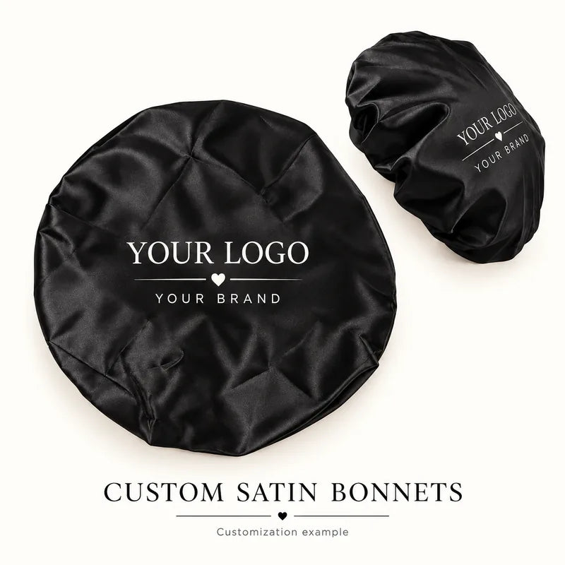 Custom black satin sleeping bonnet with personalized logo, shown from two angles — customization example