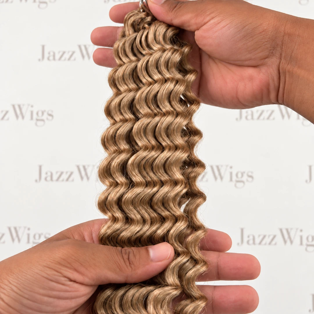 Close-up of JAZZWIGS #27 Honey Blonde Deep Wave Feather Crochet Hair texture