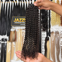 Raw Vietnamese Kinky Curly Hair Natural Black #1B — single bundle held in hand