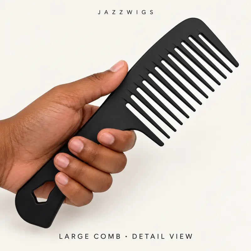Handheld detail of the large black wide-tooth comb; style is selected at random