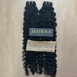 Raw Vietnamese Burmese curly hair bundles with defined curls for Black women.