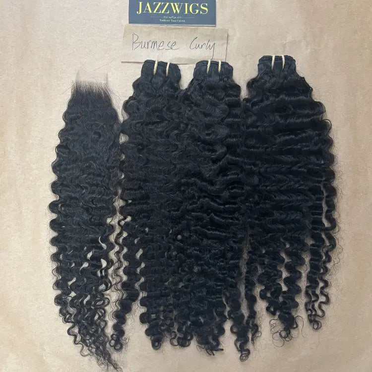 Defined Burmese curly texture paired with a 2x6 HD lace closure and natural hairline.