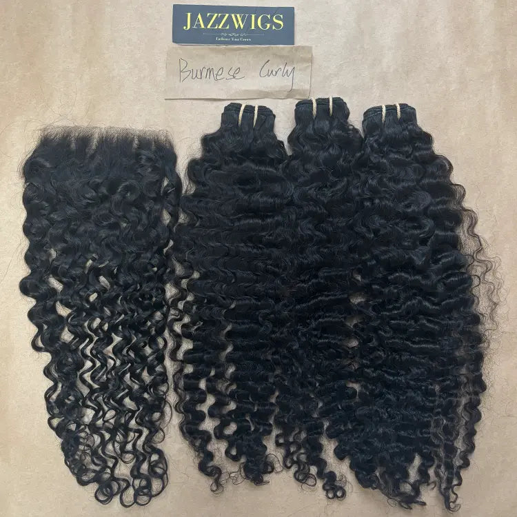 Raw Burmese curly 3 bundles with 6x6 HD lace closure for Black women.