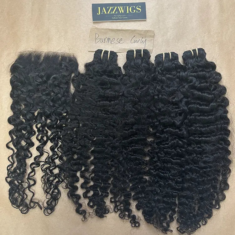 Raw Burmese curly 4 bundles with 6x6 HD lace closure for Black women.