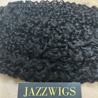 Full and bouncy raw Vietnamese French curly Black hair bundles.