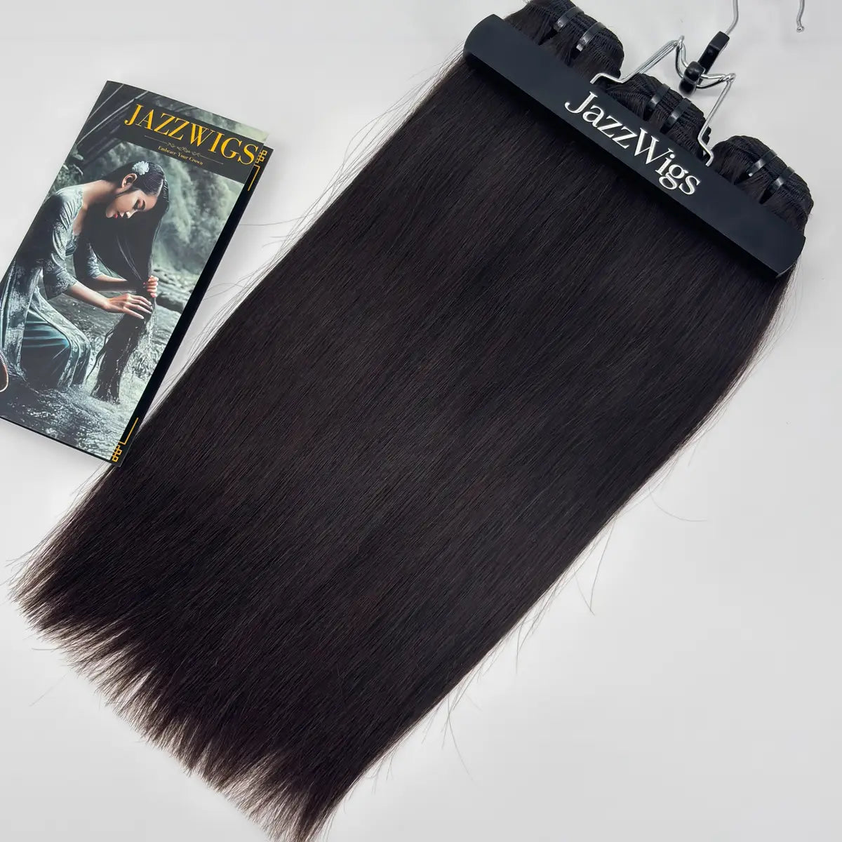 JazzWigs Raw Vietnamese Straight Hair 3 Bundle Deal in natural black, full-length product view on hanger.