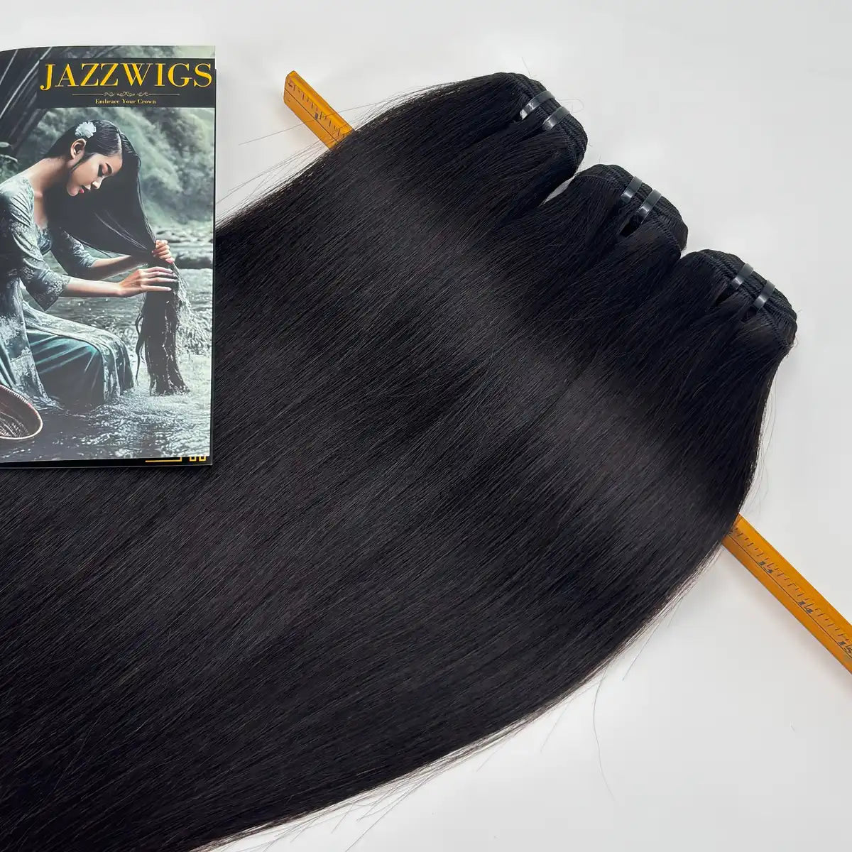 JazzWigs Raw Vietnamese Straight Hair 3 Bundle Deal close-up showing smooth straight texture, wefts and measuring ruler.