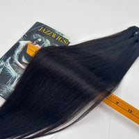 Raw Vietnamese Straight Hair length measurement detail with ruler showing natural black human hair texture and full ends.