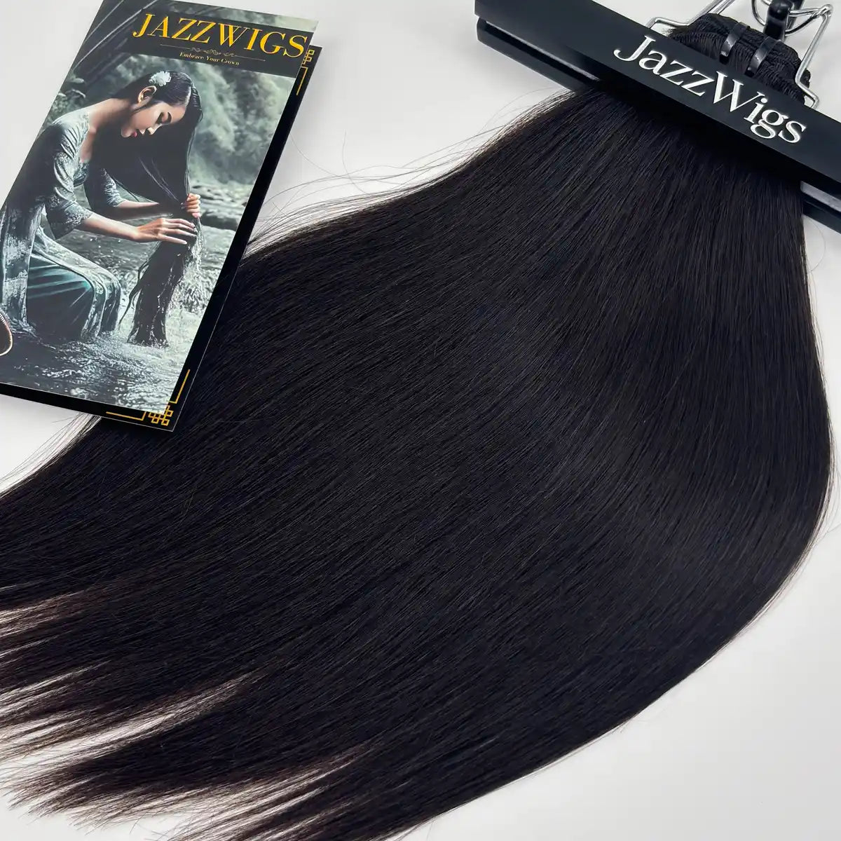 Raw Vietnamese Straight Hair weft top close-up showing machine-sewn bundle construction and natural black human hair.