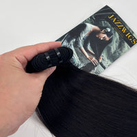 Raw Vietnamese Straight Hair close-up showing smooth straight texture, full ends and natural black human hair.
