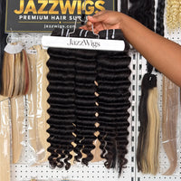 JAZZWIGS Virgin Cambodian Deep Wave human hair in natural black #1B, hanging display showing wave definition.