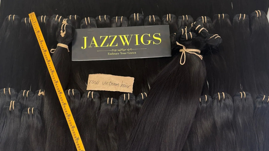 JazzWigs wholesale raw Vietnamese hair bundles showing factory inventory and length measurement for factory-direct pricing.