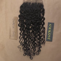 Skinlike 6x6 HD lace Burmese curly closure offering a realistic hairline.