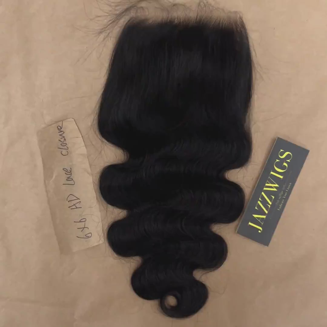 Body wave texture 6x6 HD lace closure showing an invisible melt finish.