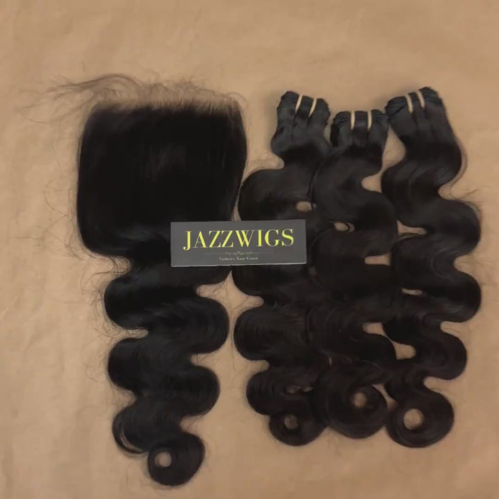 Soft and voluminous raw body wave bundles with 5x5 HD lace closure.
