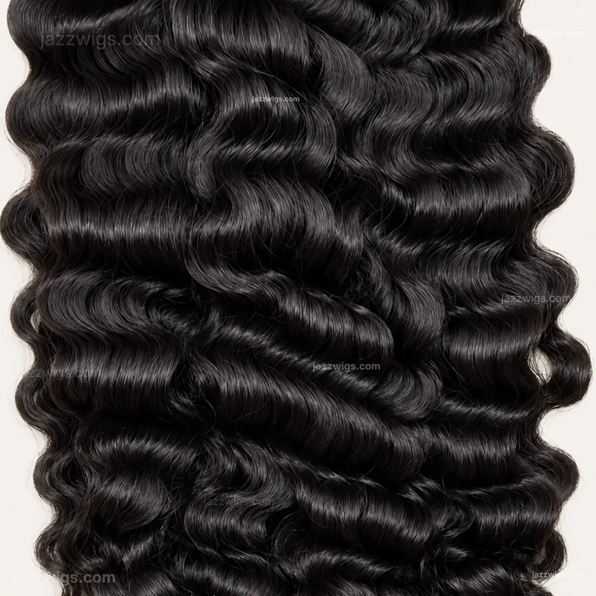 Natural black curly human hair bundles for sew-in installs and wig making.