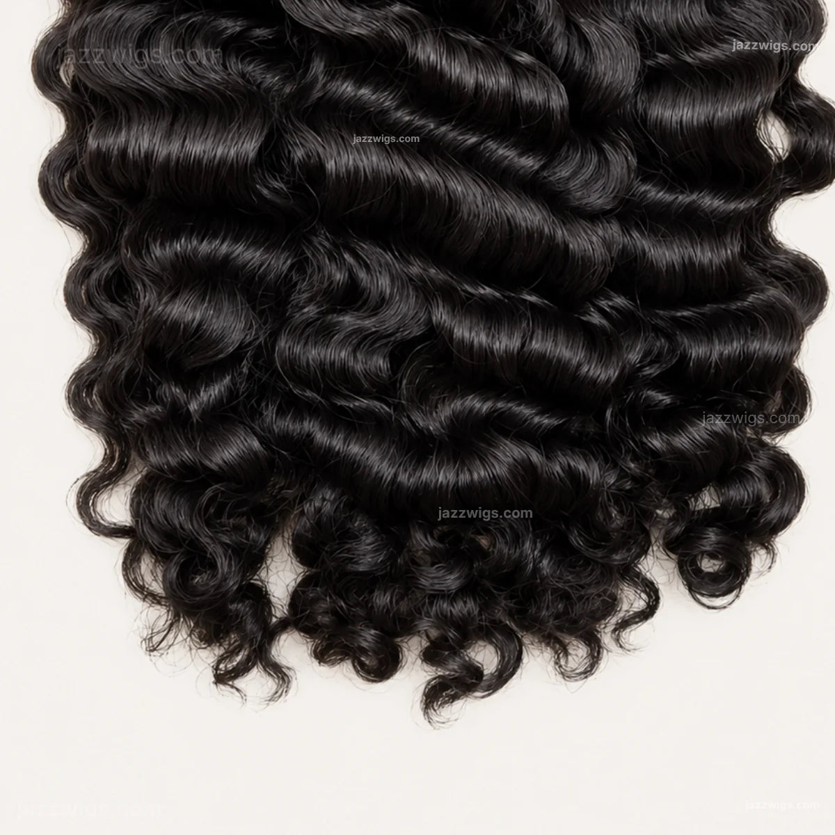 Curly human hair bundle texture detail.