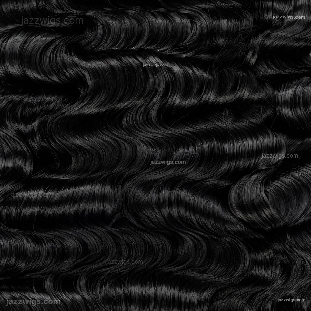 Natural black curly human hair bundles for sew-in installs and wig making.