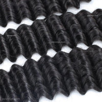 Deep wave human hair bundle texture detail.