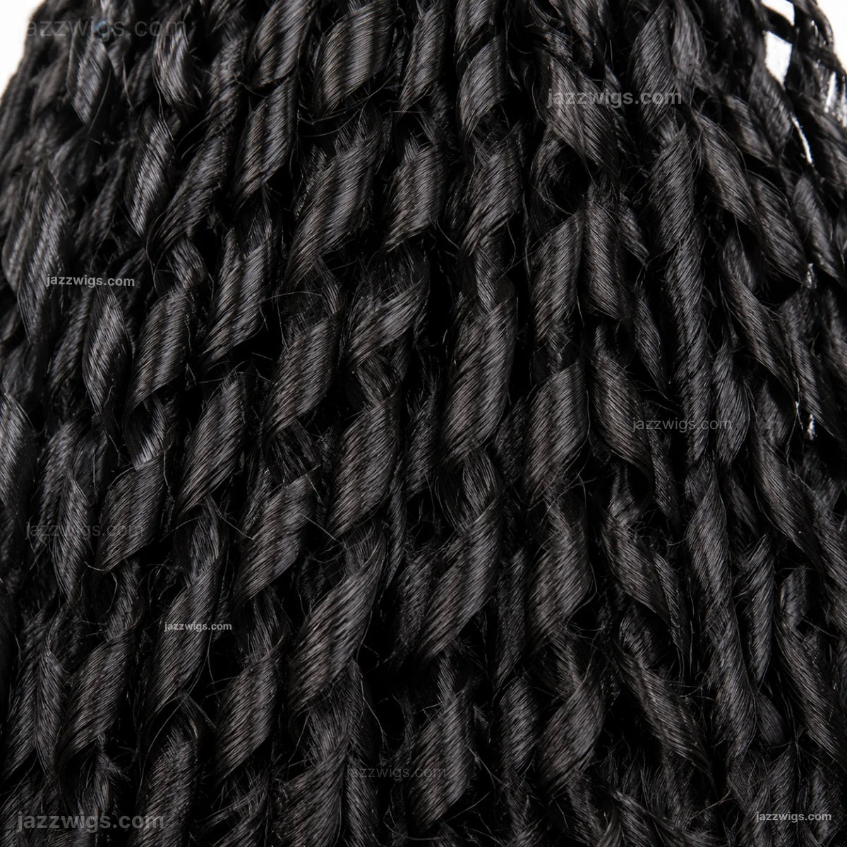 Human hair bundles with soft curly texture and full ends.